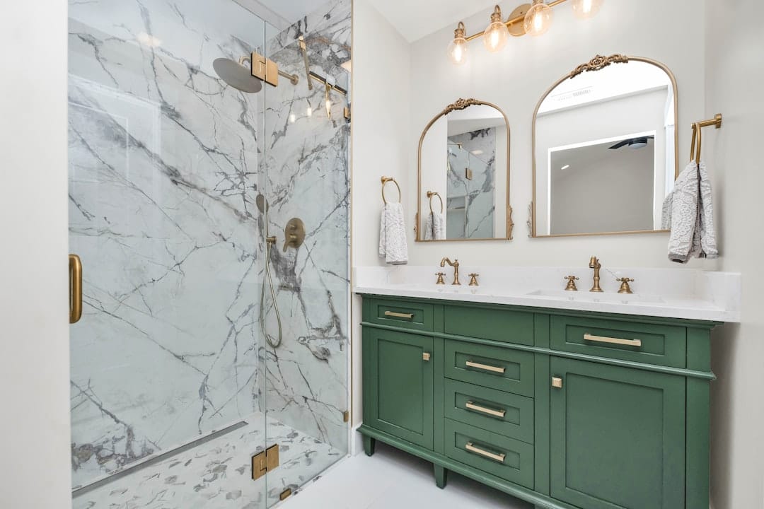 Elegant bathroom renovation by GMC Construction Inc. featuring a modern shower, stylish fixtures, and premium tile work in a Toronto home.