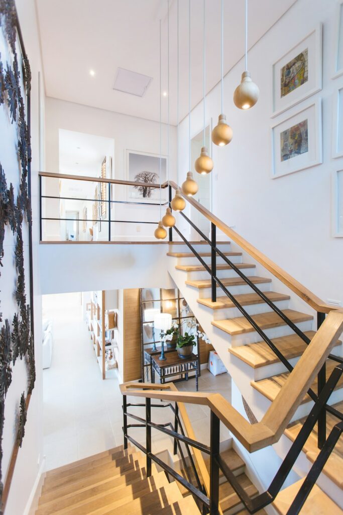Home renovation featuring a modern kitchen, updated bathroom, and open-concept living area by GMC Construction Inc.