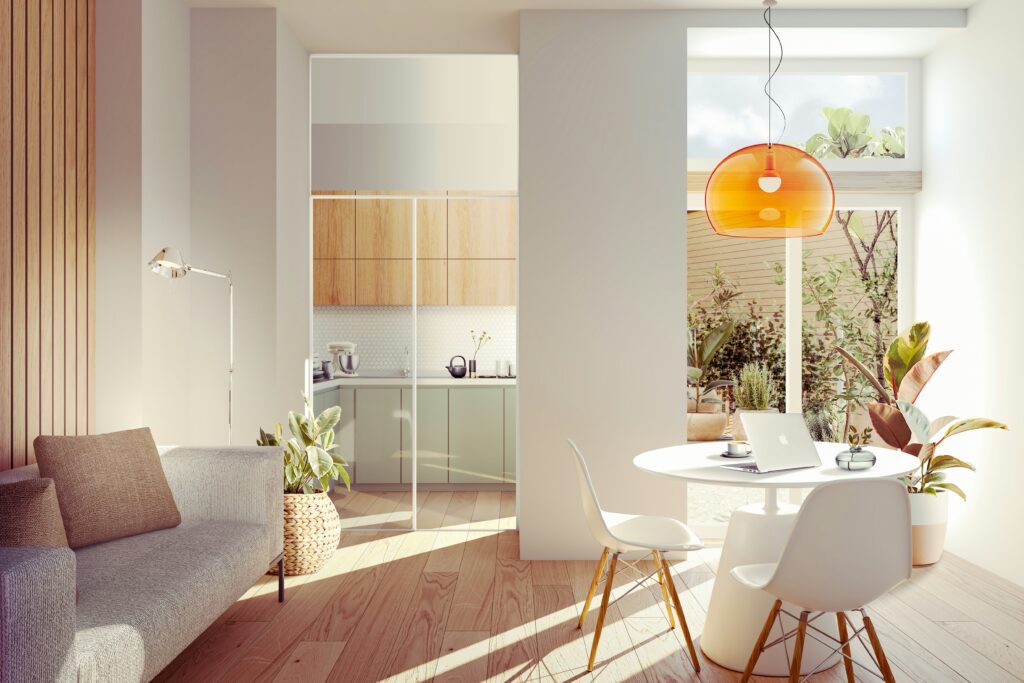 Modern kitchen renovation featuring new cabinets, quartz countertops, and stainless steel appliances.