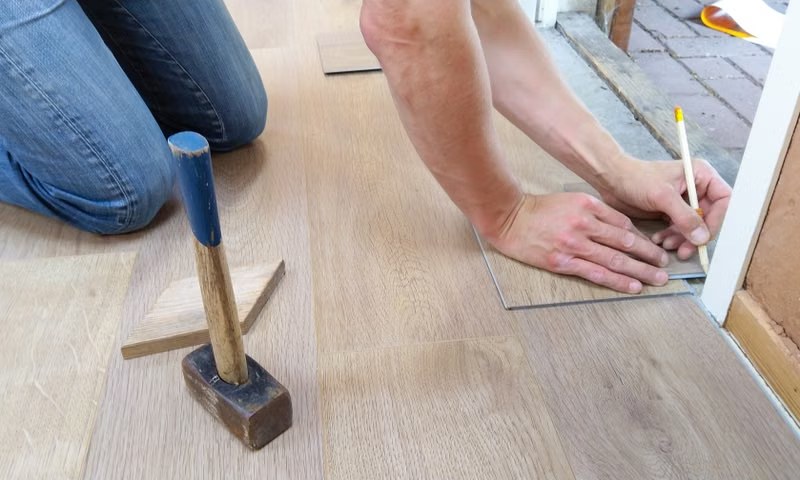 Installing hardwood flooring planks