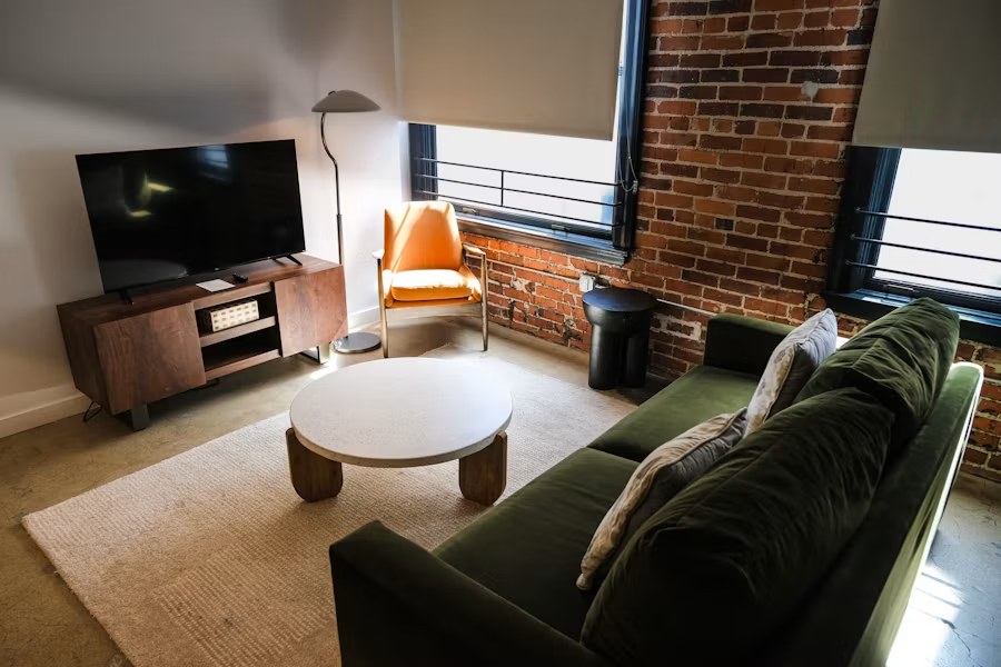 Condo living room with modern window treatments