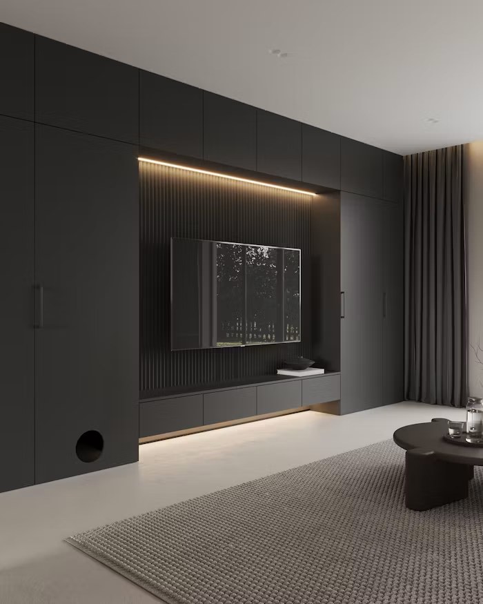 Basement feature wall with mounted TV and shelving