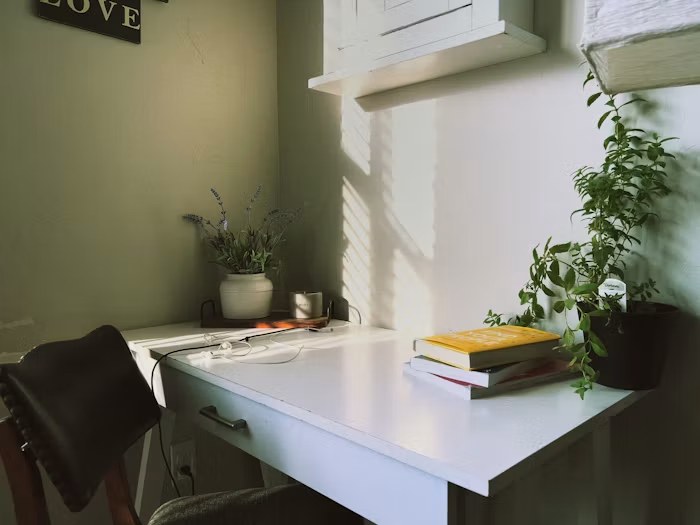 Basement home office with a built-in desk