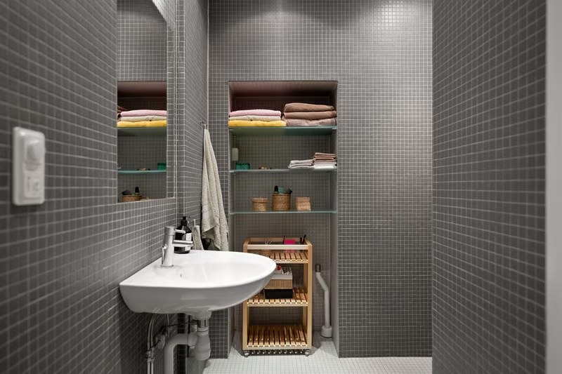 Finished basement bathroom with shower and vanity