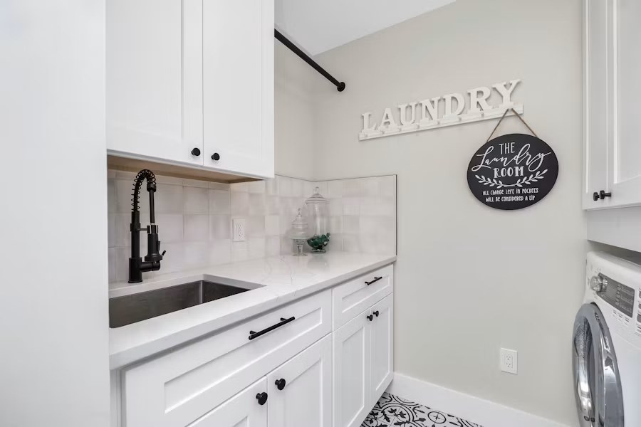 Organized laundry room with IKEA cabinetry